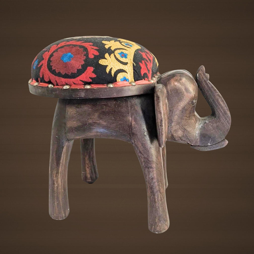 Hand-Carved Wooden Elephant Footstool: Colorful Boho Floral Upholstery - The Relic Detail