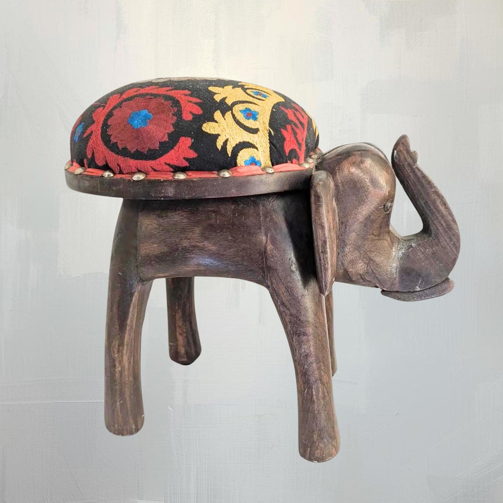 Hand-Carved Wooden Elephant Footstool: Colorful Boho Floral Upholstery - The Relic Detail