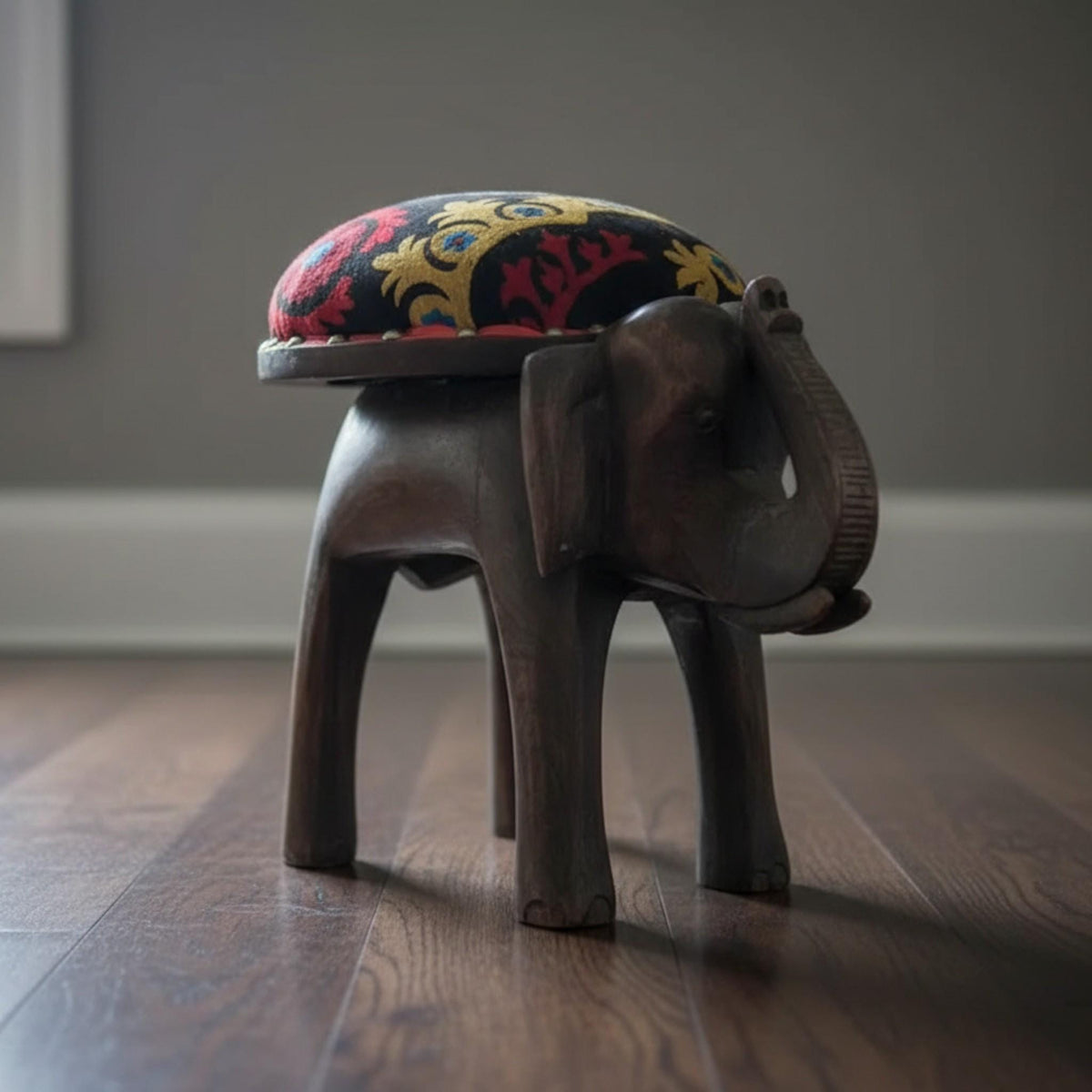 Hand-Carved Wooden Elephant Footstool: Colorful Boho Floral Upholstery - The Relic Detail